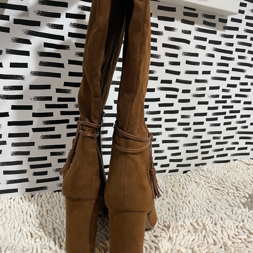Calf length heel boots